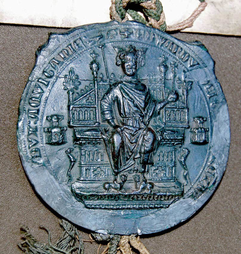 Wax seal of Edward II depicting the King seated on a grand throne
