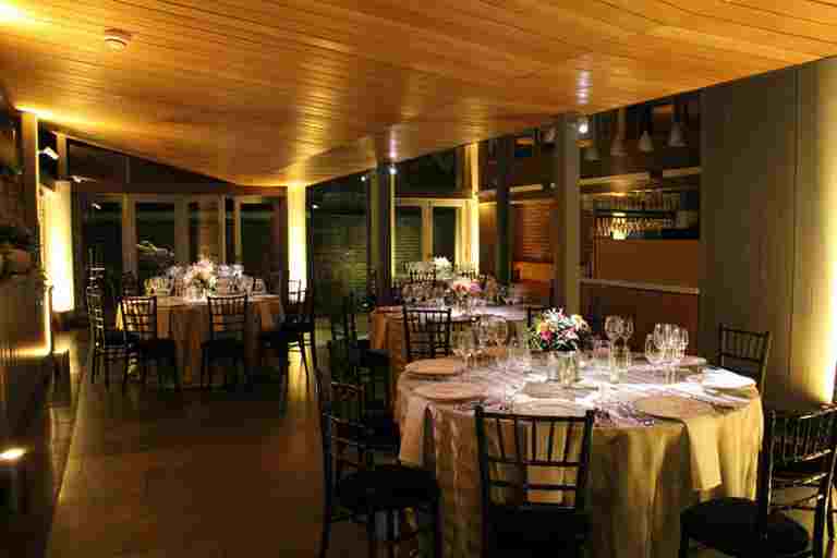 Setting for an intimate corporate dinner in the Cellarium Terrace, Westminster Abbey
