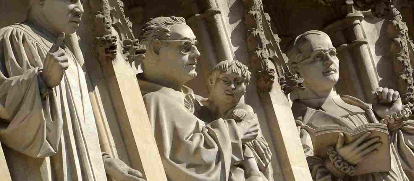 Statues of the Reverend Dr Martin Luther King Jr, St Oscar Romero and Dietrich Bonhoeffer above the West Door of Westminster Abbey