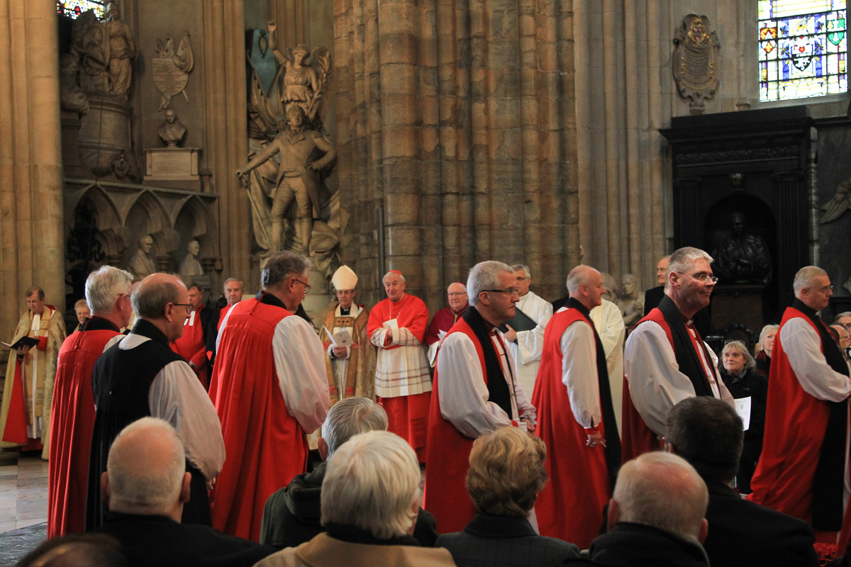 Visiting clerics from a number of different churches process in the Abbey Church at the start of the service
