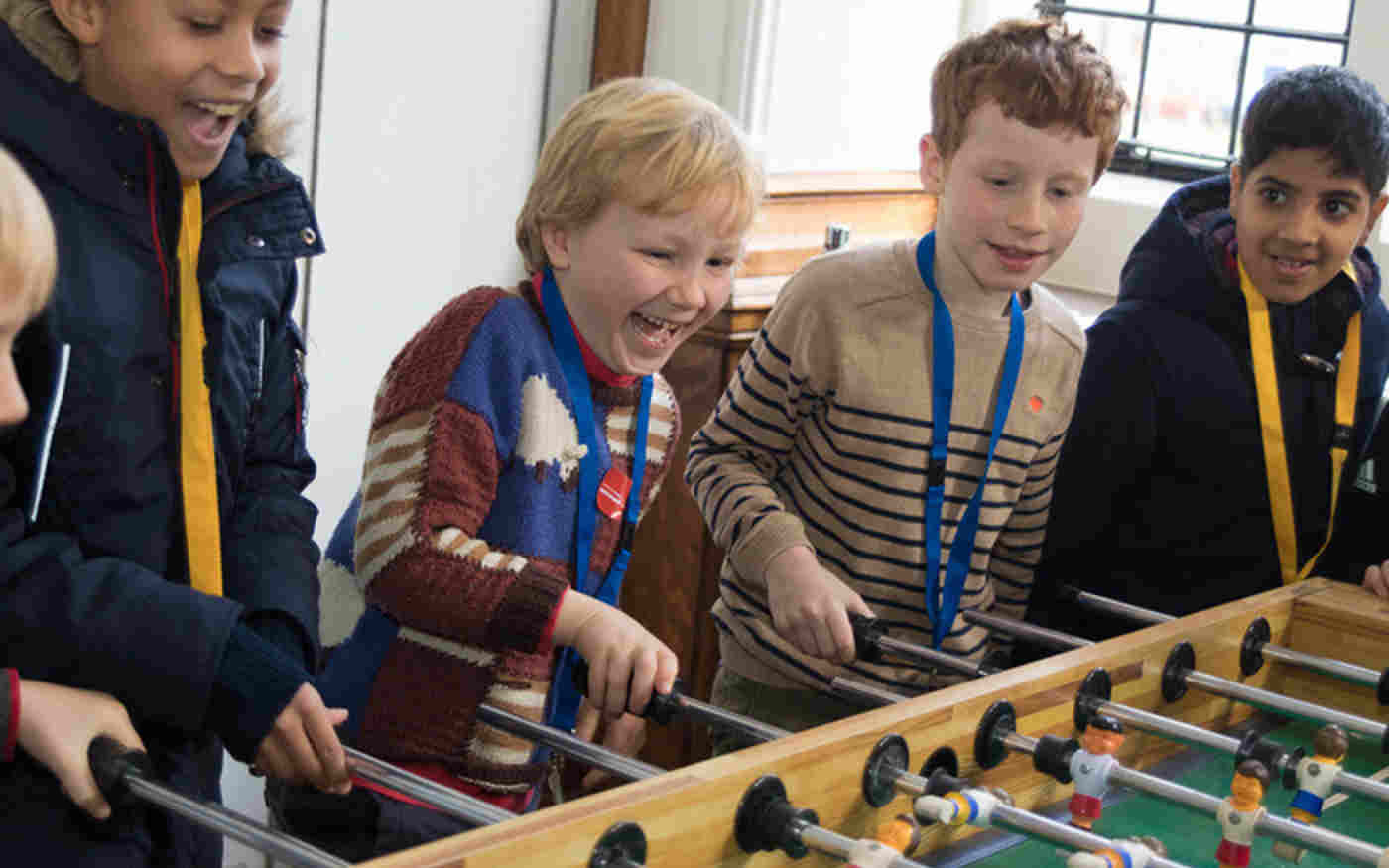 Boys playing subbuteo during a Westminster Abbey Choir School 'Chorister Experience Day'