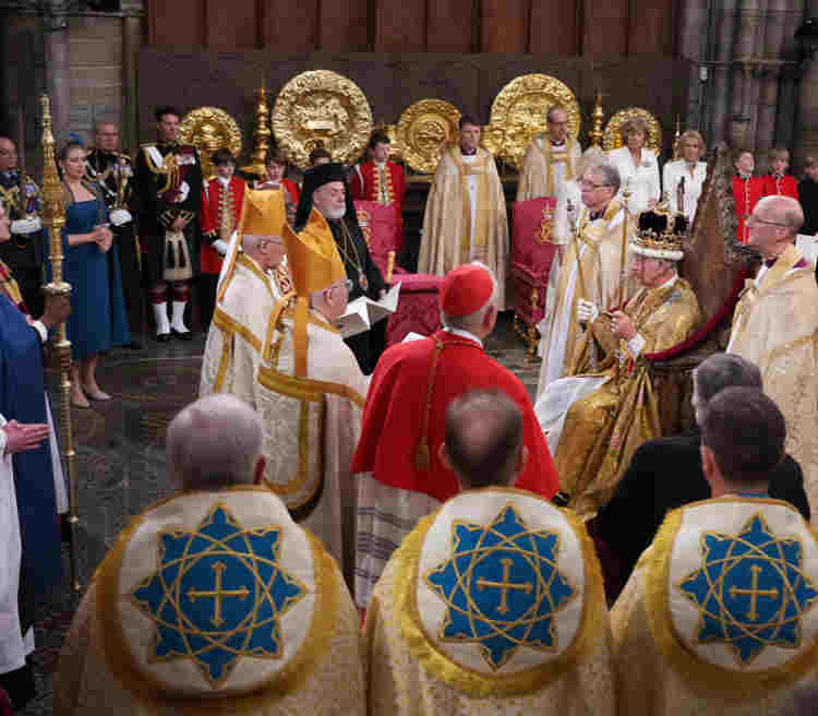 Photograph of HM King Charles III at his coronation during the Investiture, when the royal regalia was presented to him