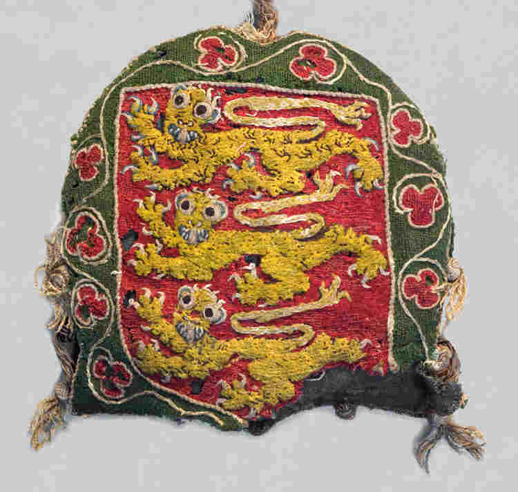 Embroidered seal bag depicting the Royal Arms of England, with three yellow lions