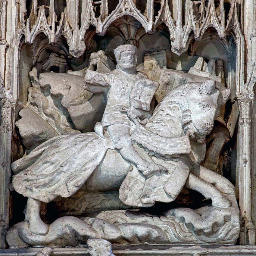 Stone carving of Henry V charging into battle on his horse