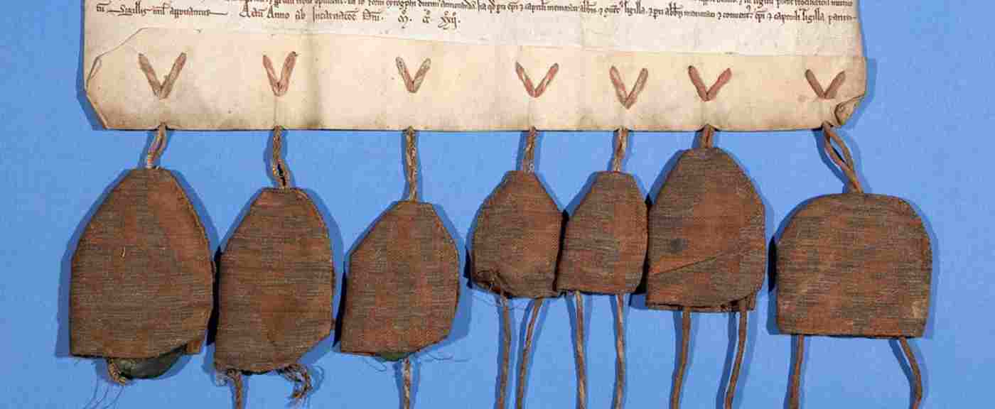 Seal bags attached to a manuscript in the collection of the Westminster Abbey Library