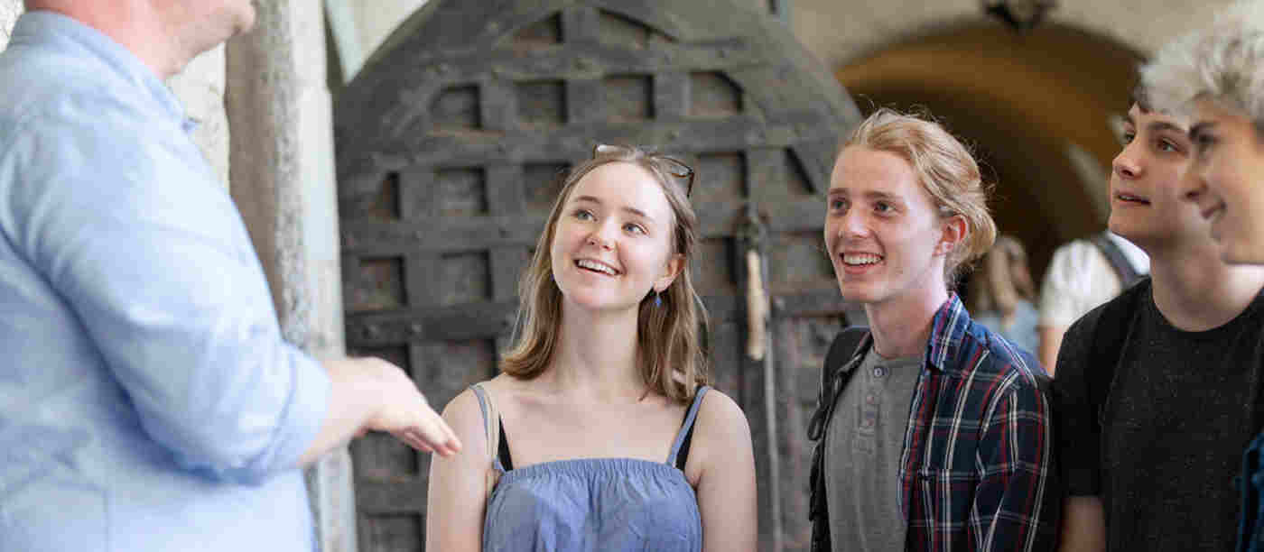 Photograph of teenagers on a tour of Westminster Abbey