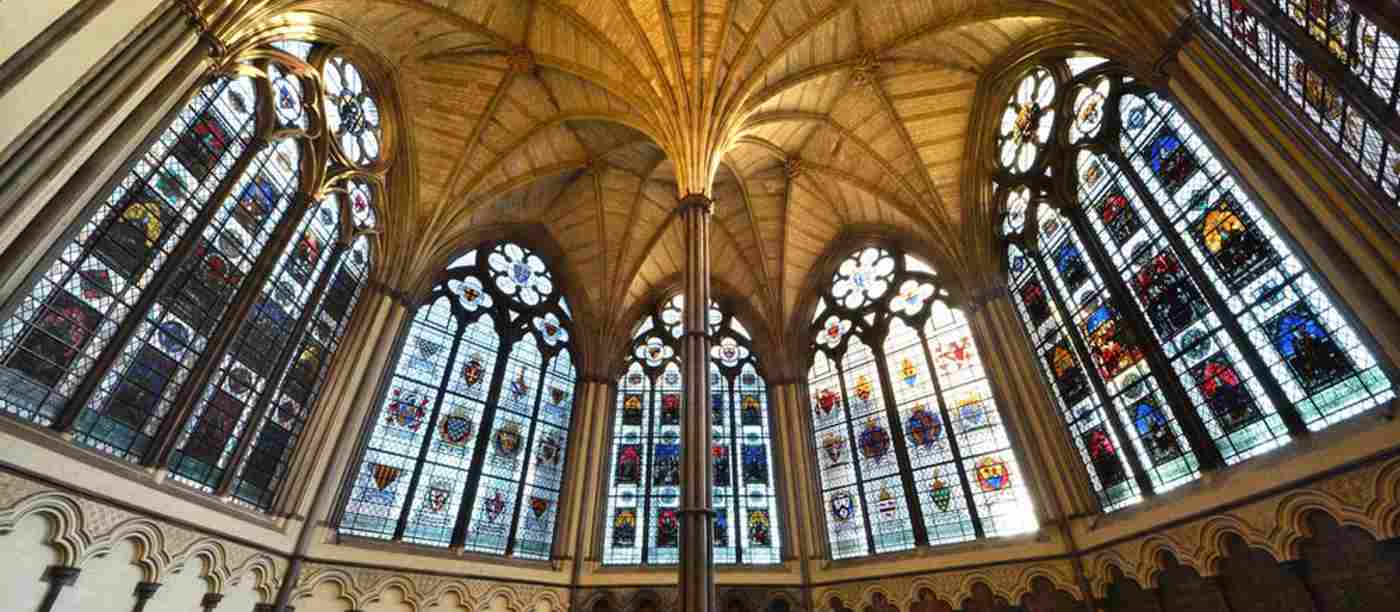 Stained glass windows and the central pillar of the Chapter House, Westminster Abbey