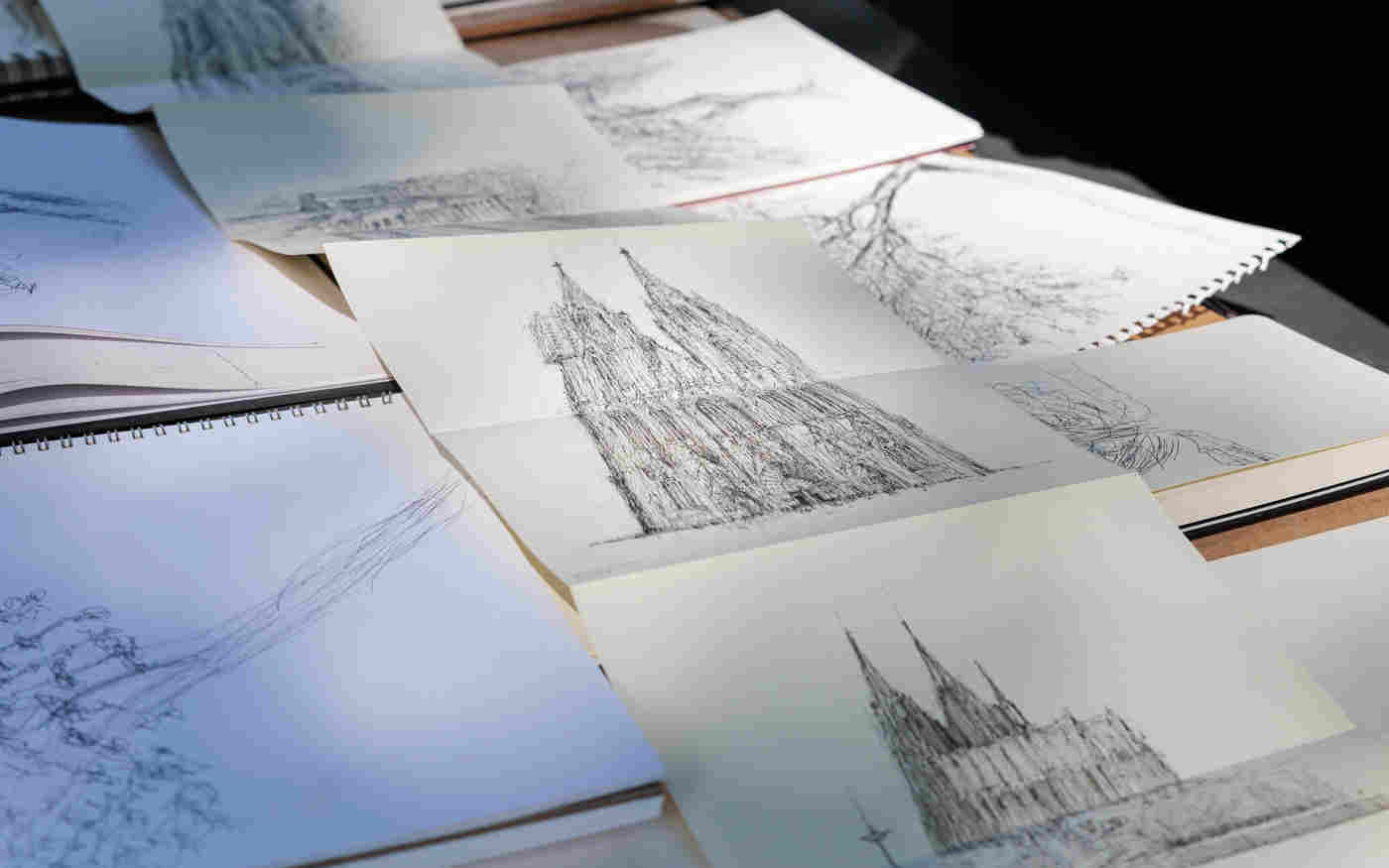 Photograph of multiple pencil drawings of the exterior of Westminster Abbey