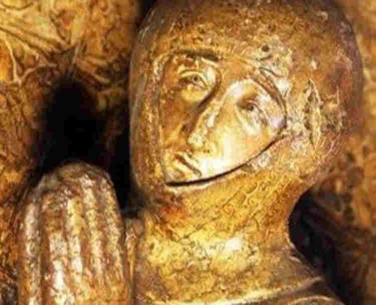 Photograph of a knight's statue within Westminster Abbey, representing mutual respect, one of the British Values