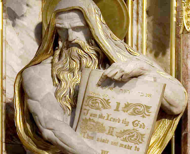 Statue of Moses carrying the Ten Commandments on the High Altar within Westminster Abbey