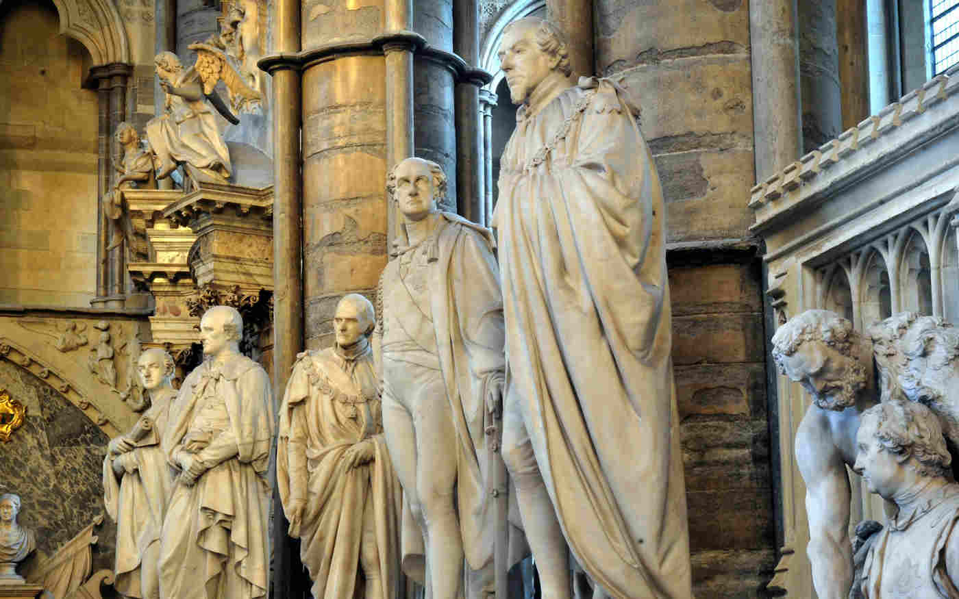 Photograph of statues within Statesmen's Aisle of Westminster Abbey