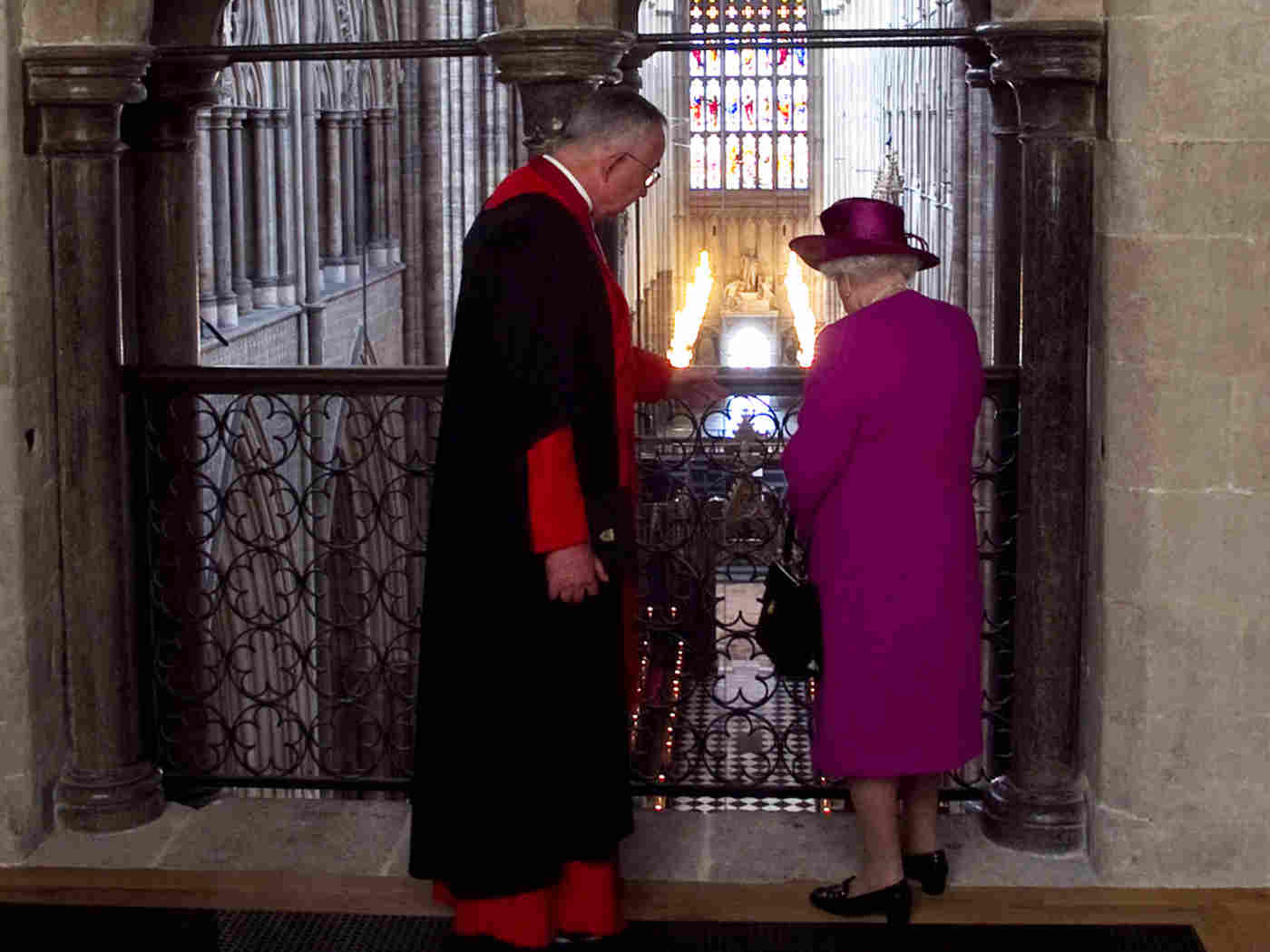 The Queen looks down into the Abbey church from the Galleries